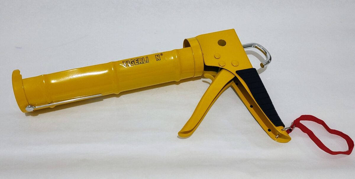 Pistola Aplicadora amarilla puno goma - Imagen 1