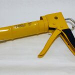 Pistola Aplicadora amarilla puno goma